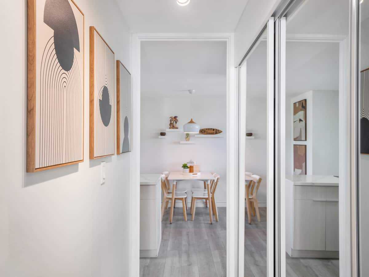 Hallway from the dining area toward the bathroom and bedroom
