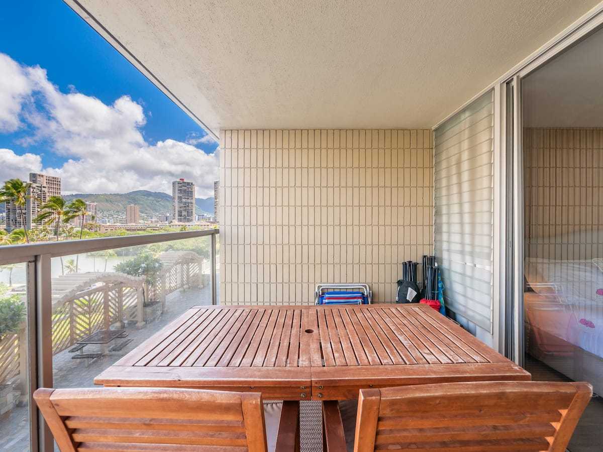 Wood dining table on the covered lanai
