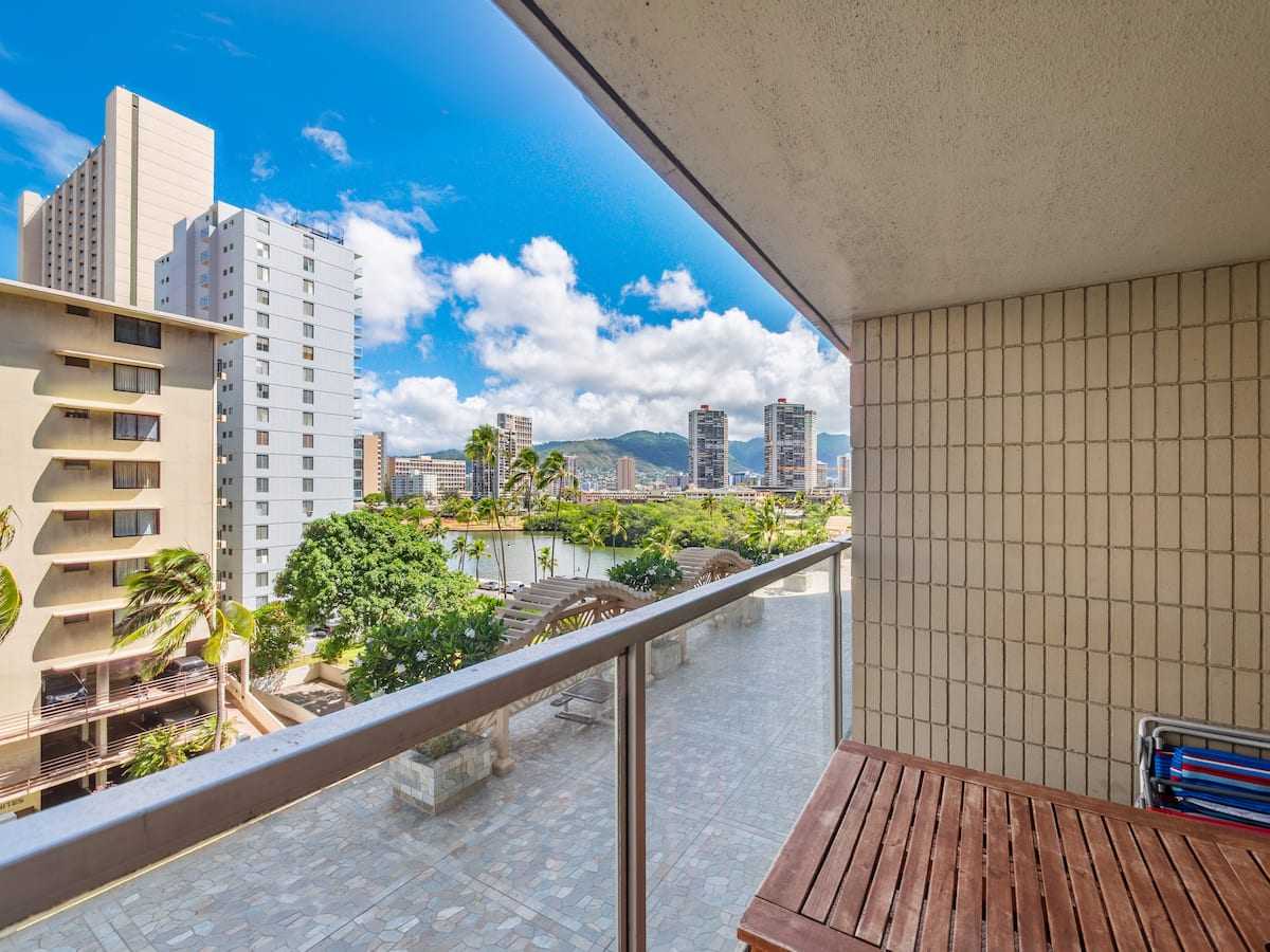Covered lanai overlooking the Ala Wai Canal and the Waikīkī skyline